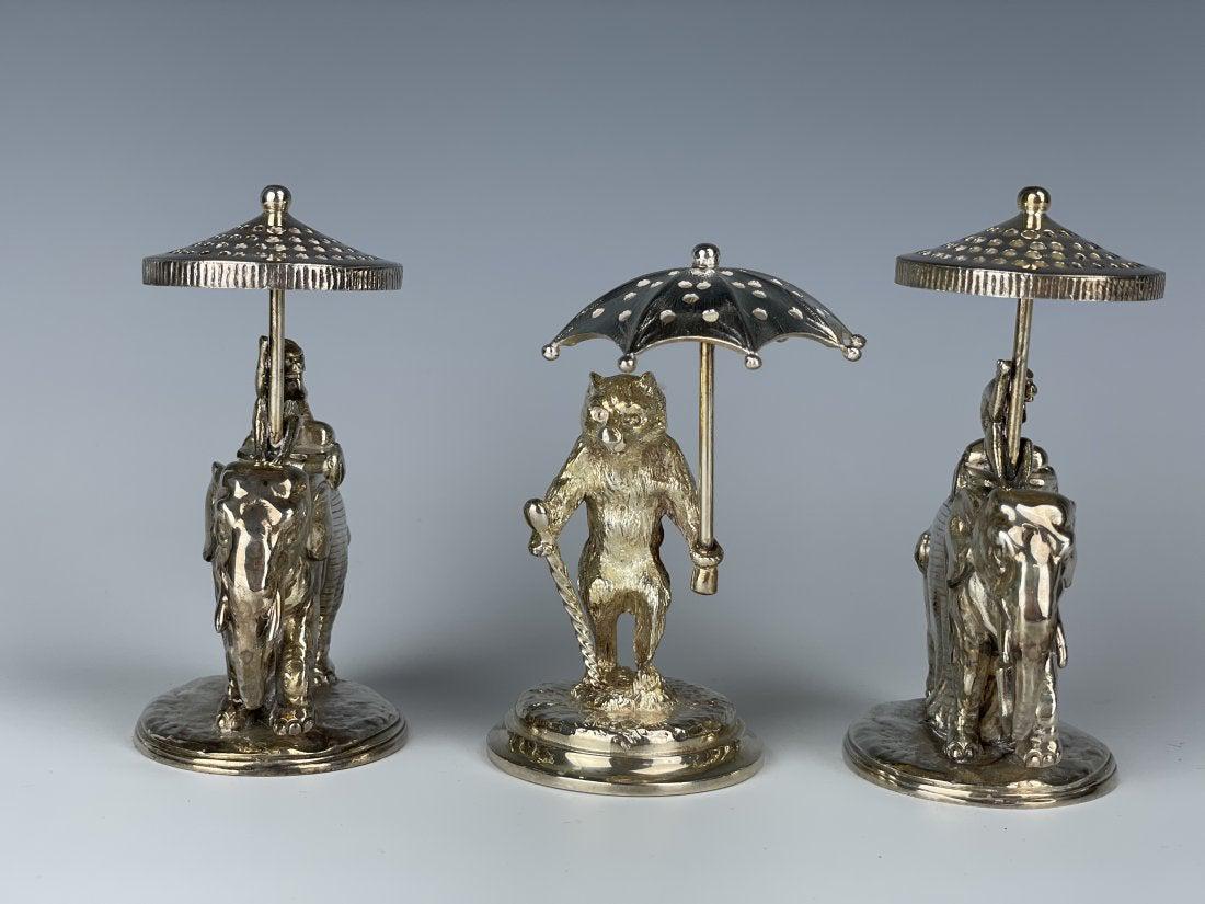 SET OF 3 CHRISTOFLE SILVER PLATED ORNAMENTS: Circa 1950. Could be used as paper weight. Measure 4.5 inches tall. All stamped CHRISTOFLE .Estimate $500-600