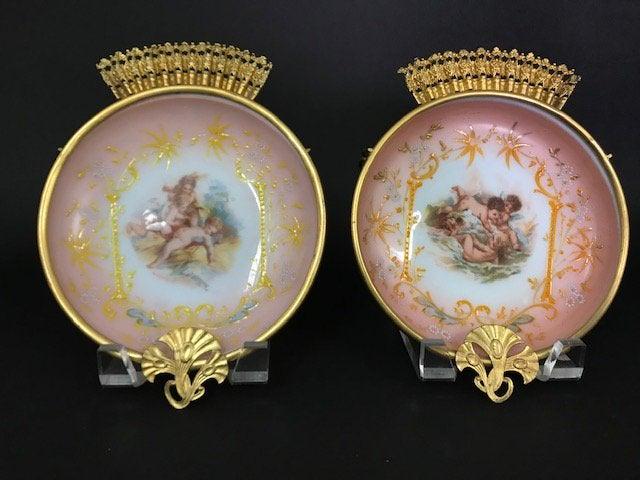 A PAIR OF ENAMELED BACCARAT OPALINE WALL PLAQUES (1 of 5)