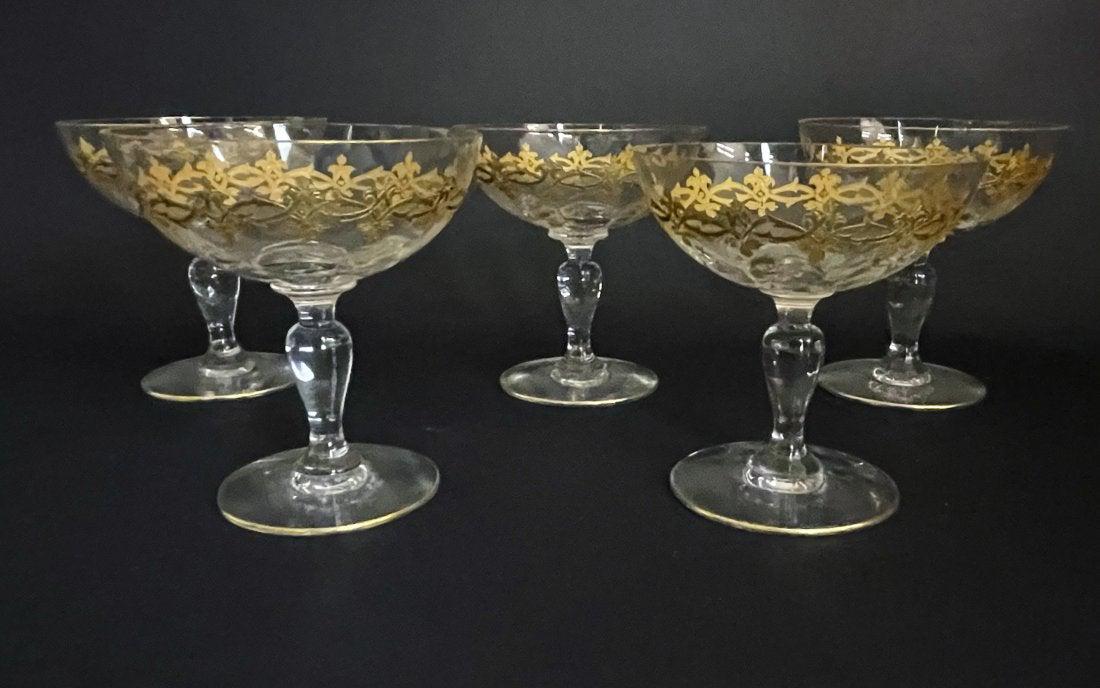 SET OF 5 GILT ST LOUIS WINE GLASSES: Circa 1900. Measure 6 inches . Good used condition. Estimate $400-500