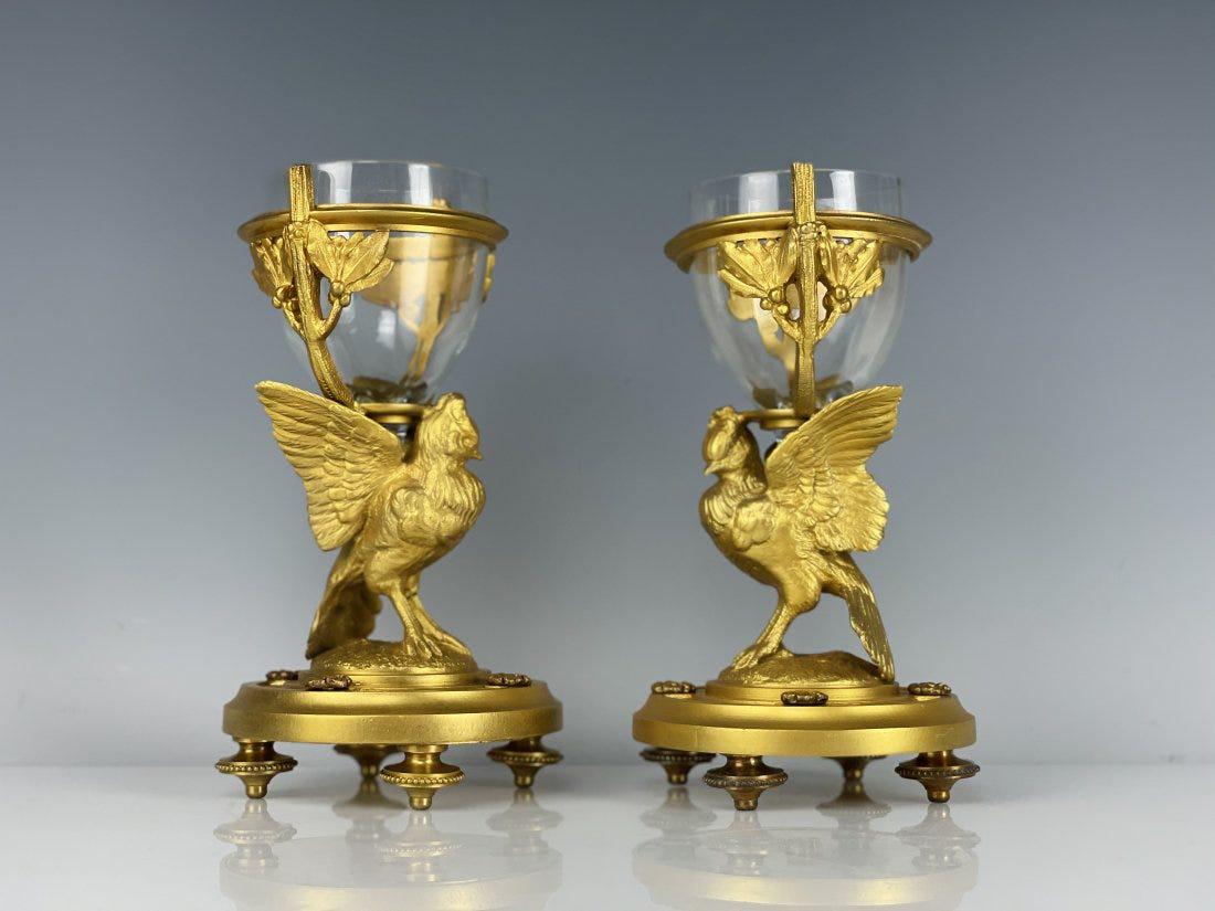 A PAIR OF SIGNED BACCARAT AND ORMOLU SALTS: Circa 1900. Both stamped Baccarat , measure 7.5 inches tall. In excellent antique condition.Estimate $1.200-1.500