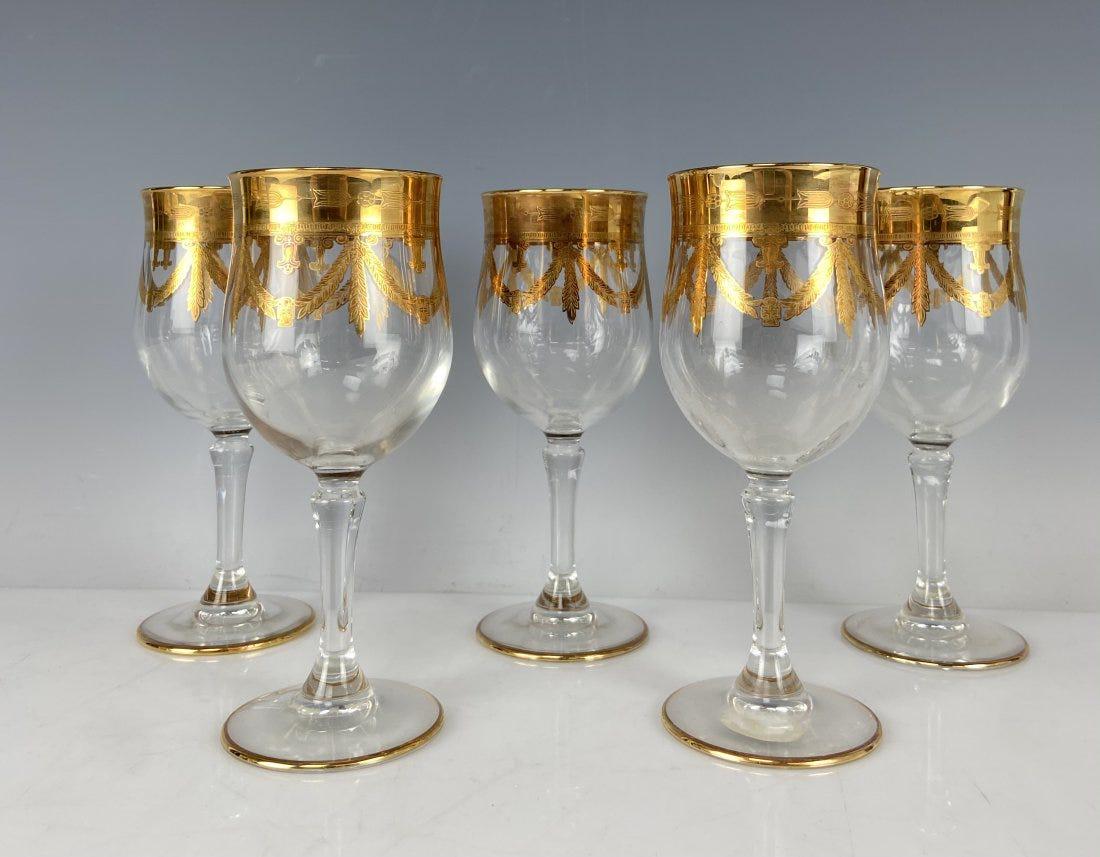 SET OF 5 GILT WINE GLASSES: Erasure 6 inches high. All in good condition. Estimate $300-400
