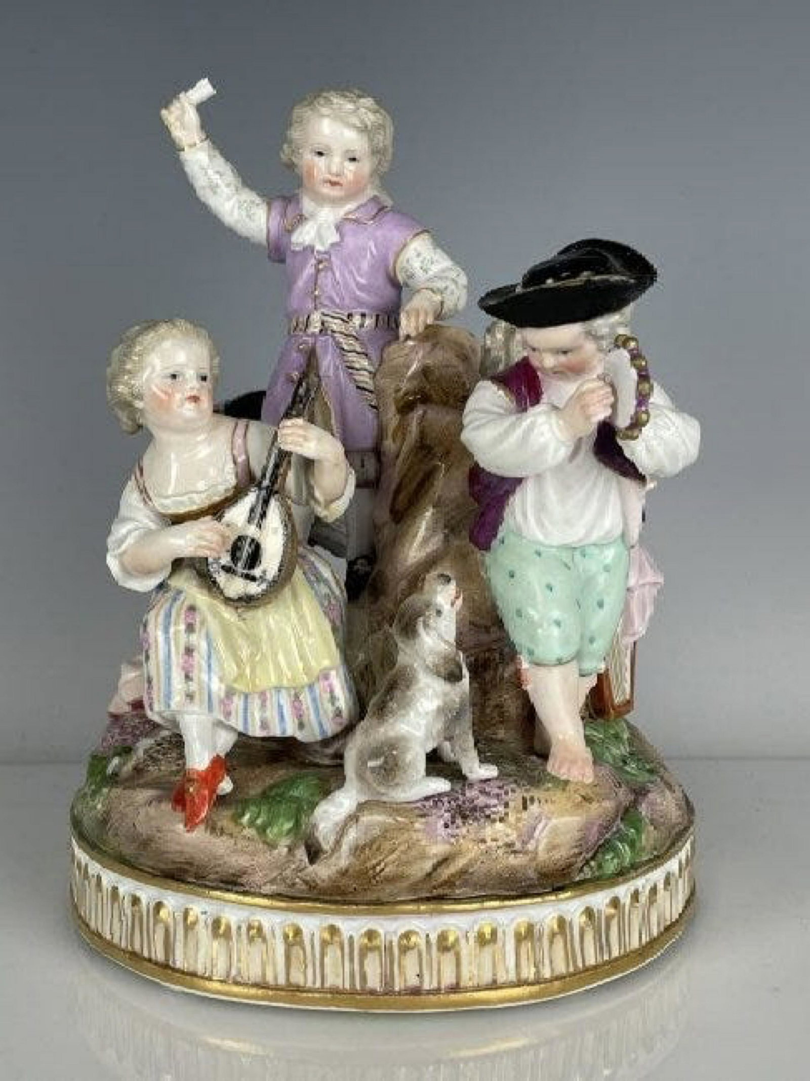 19TH C. MEISSEN PORCELAIN GROUP: Measures 6.5 inches tall. Estimate $1.200-1.500