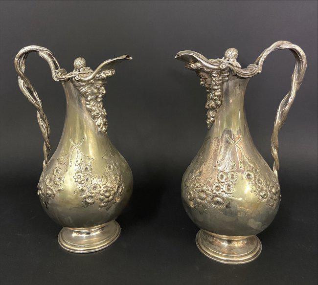 A PAIR OF 19TH C. SILVER PLATED CLARET JUGS (1 of 3)