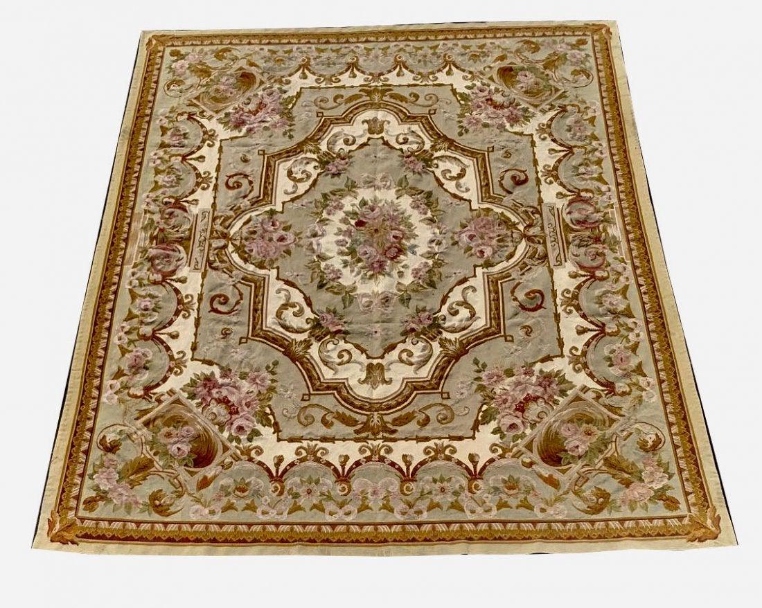 A HANDMADE AUBUSSON CARPET: Measures 117 inches x 92 inches. In good condition. Estimate $2.000-2.500