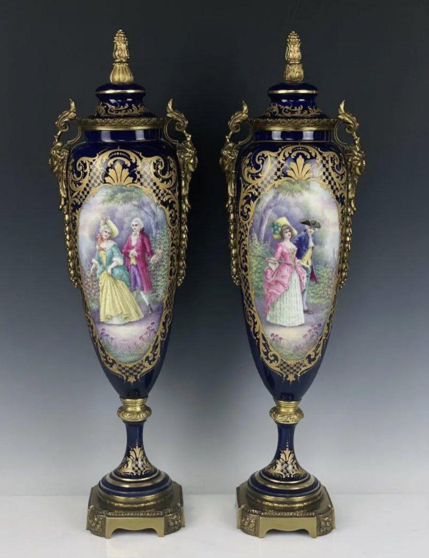A LARGE PAIR OF ORMOLU MOUNTED SEVRES VASES (1 of 5)