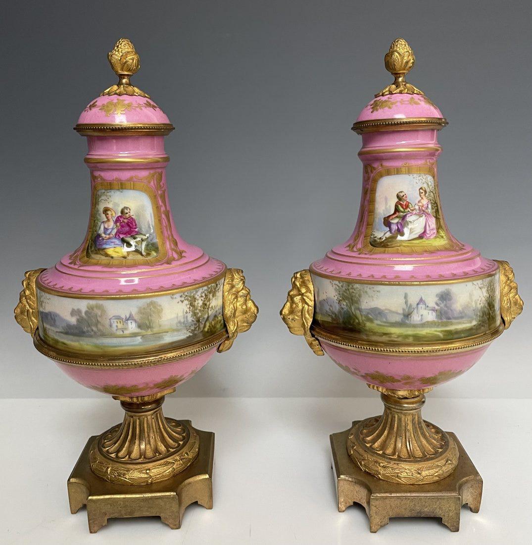 A PAIR OF ORMOLU MOUNTED SEVRES PORCELAIN VASES (1 of 3)