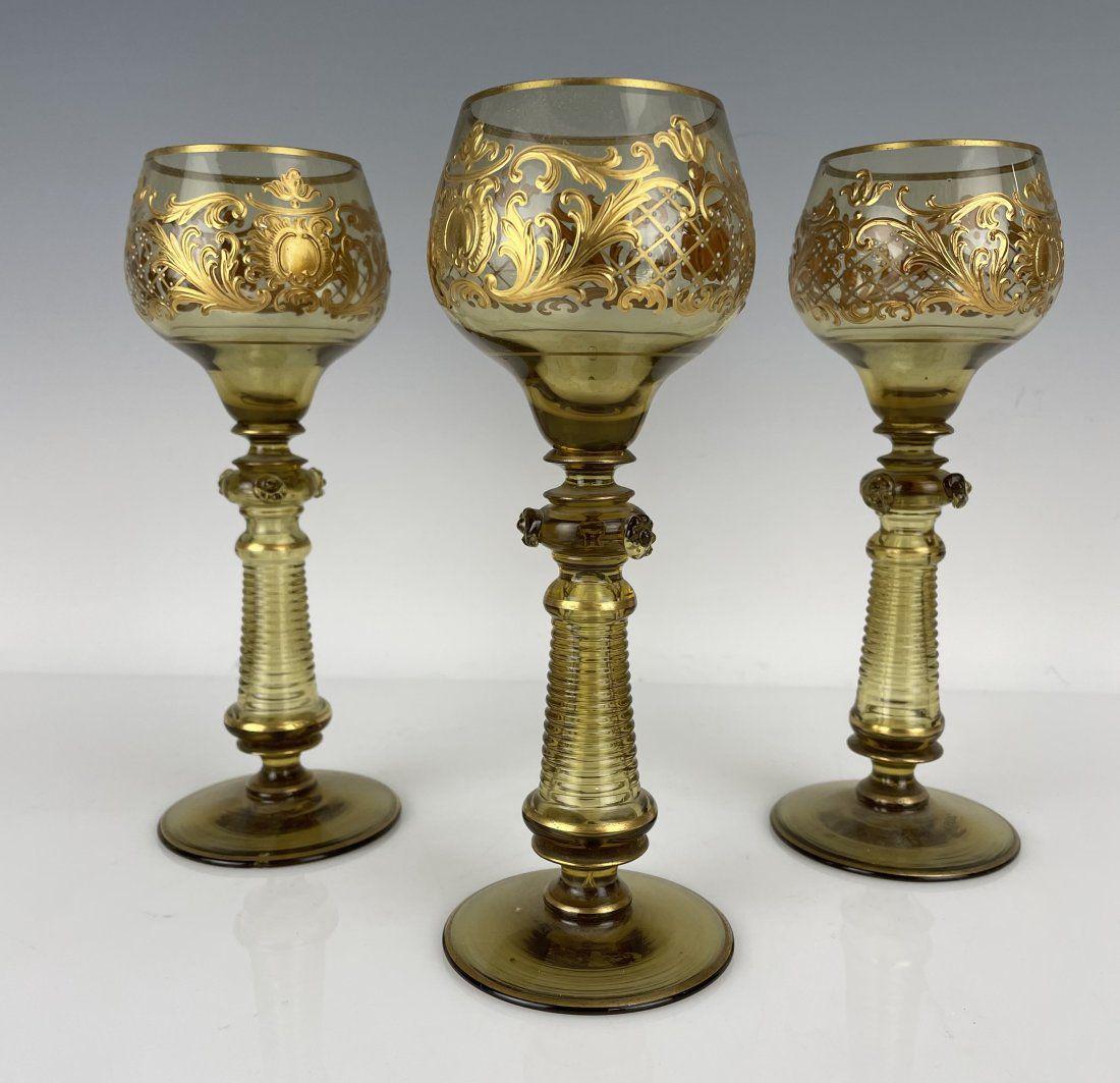SET OF 3 ENAMELED AND GILT MOSER WINE GLASSES: Circa 1900. Measure 7” tall. In good condition. Estimate $400-500