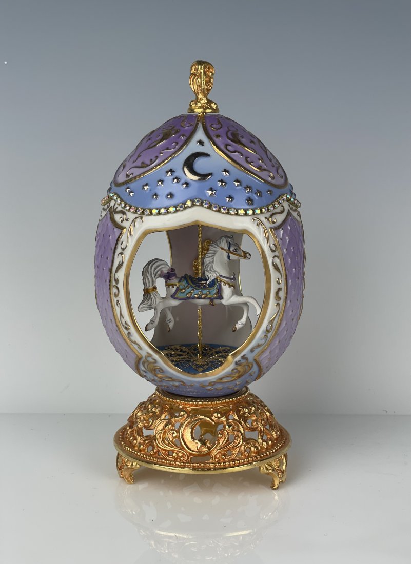 FABERGE EGG: Measures 5 inches tall. Estimate $200-300