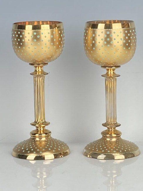 A GILT AND JEWELED PAIR OF MOSER WINE GLASSES: Circa 1900. Measure 7.5 inches tall. In good condition, very minor gilt loss. Estimate $500-600