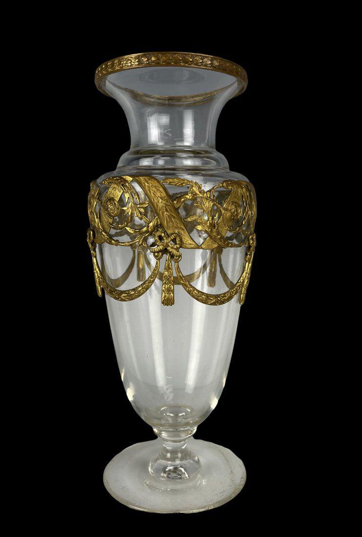 ORMOLU MOUNTED BACCARAT GLASS VASE: Circa 1900. Measures 8 inches tall. In good used condition. Estimate $400-500