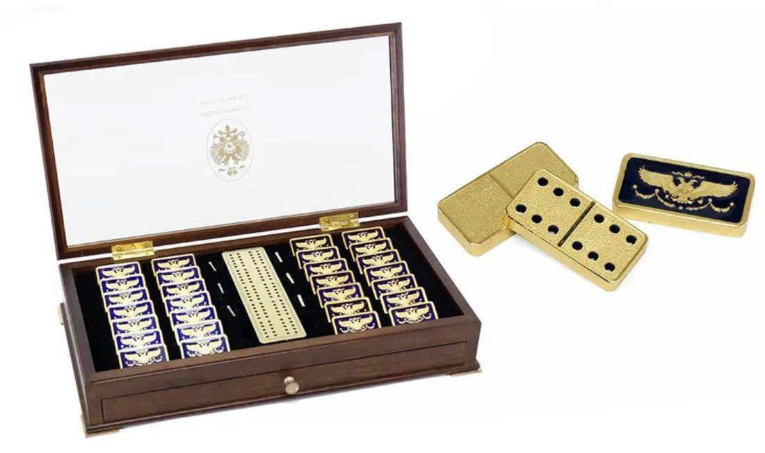 IMPERIAL FABERGE 22KT GOLD PLATED ENAMELED DOMINO SET: A RARE SET OF 22K GOLD PLATED IMPERIAL HOUSE OF FABERGE DOMINOS within original box. 37 cm x 20 cm.Good condition. Estimate $2.000-2.500