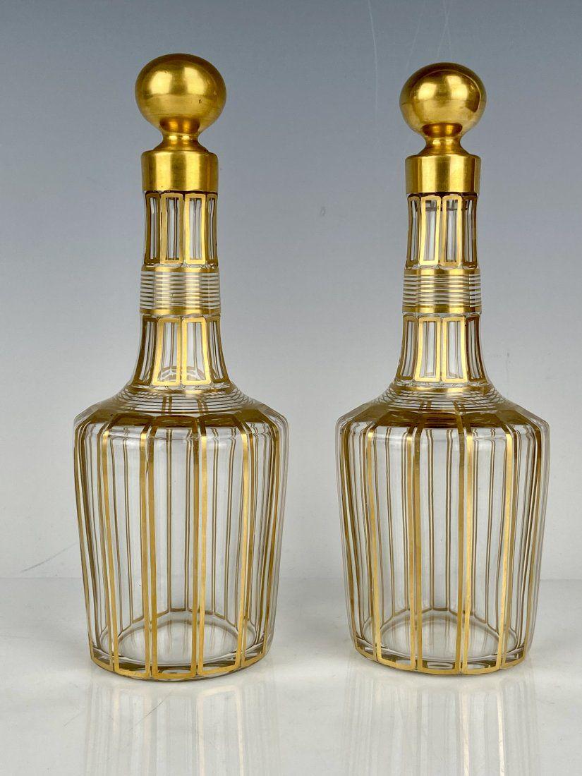 A PAIR OF GILT BACCARAT LIQUOR BOTTLES (1 of 3)