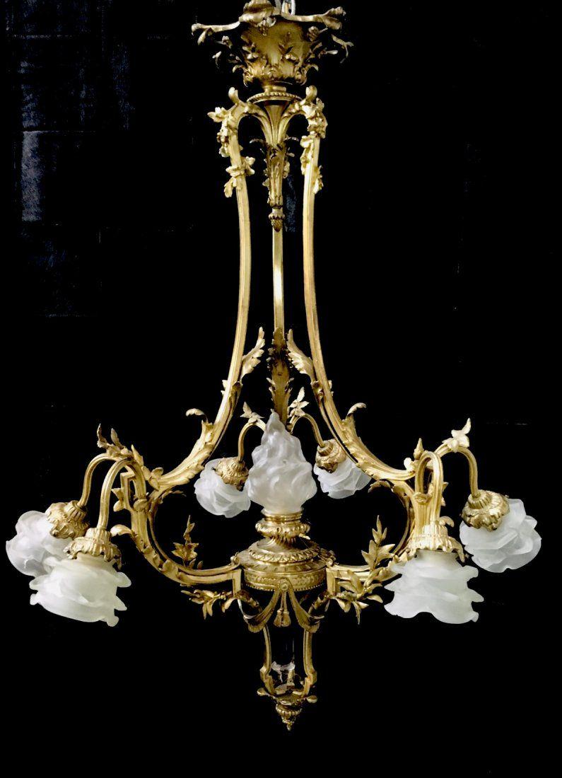 7 LIGHT ORMOLU CHANDELIER: Measurement: 40"High x 37"WideNumber of lights: 7Estimate $3000-4000