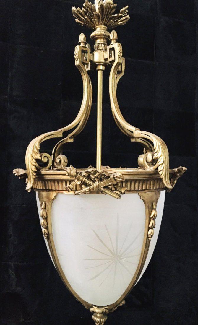 DORE BRONZE AND ETCHED GLASS CHANDELIER: Circa 1900. Dimensions: 33"High x 17"Wide. In good condition. Estimate $2.000-2.500