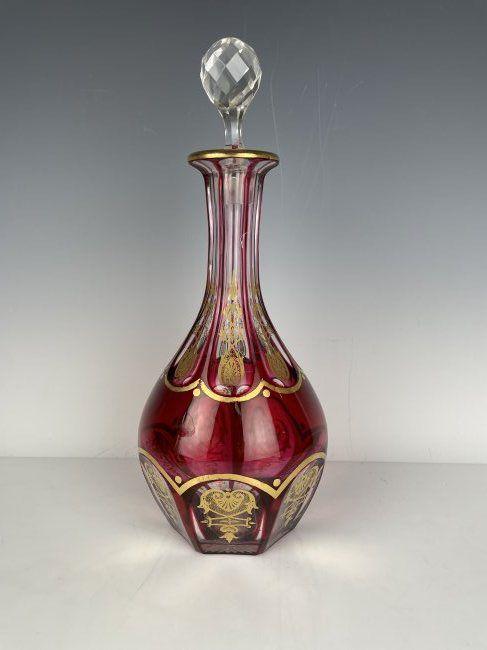 A GILT BACCARAT LIQUOR BOTTLE (1 of 3)