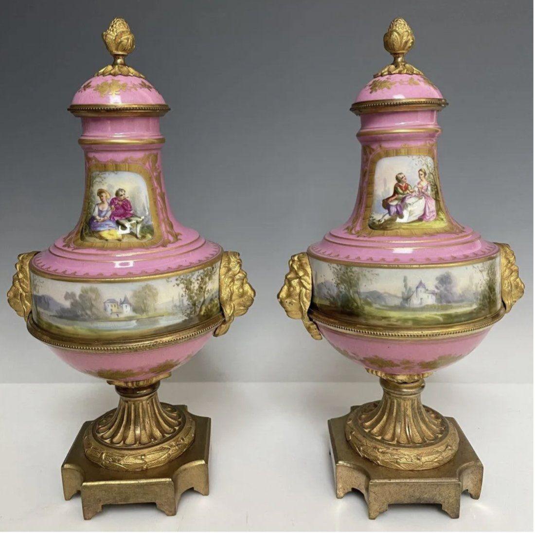 A PAIR OF ORMOLU MOUNTED SEVRES PORCELAIN VASES (1 of 3)