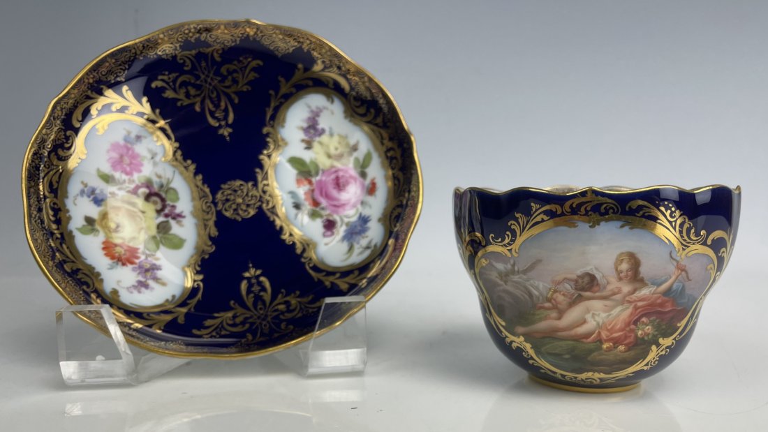 A MAGNIFICENT MEISSEN BLUE GROUND CUP AND SAUCER: Circa 1900. In mint condition. Estimate $5.000-6.000