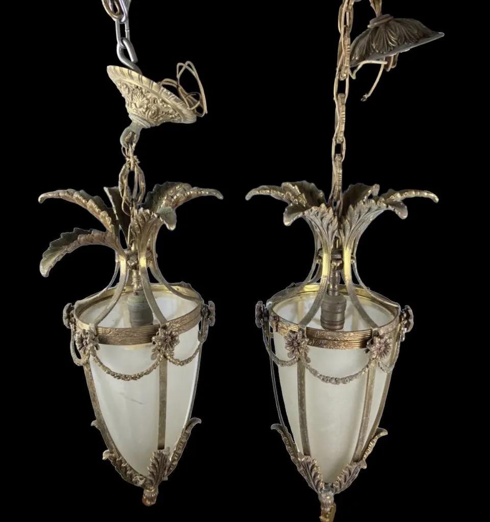 A PAIR OF ORMOLU AND GLASS LANTERNS (1 of 1)