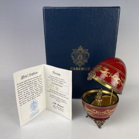 IMPERIAL FABERGE LIMOGES &STERLING CAT EGG: Marked 925 and stamped Faberge. In original presentation box. In good condition.Estimate $1200-1500