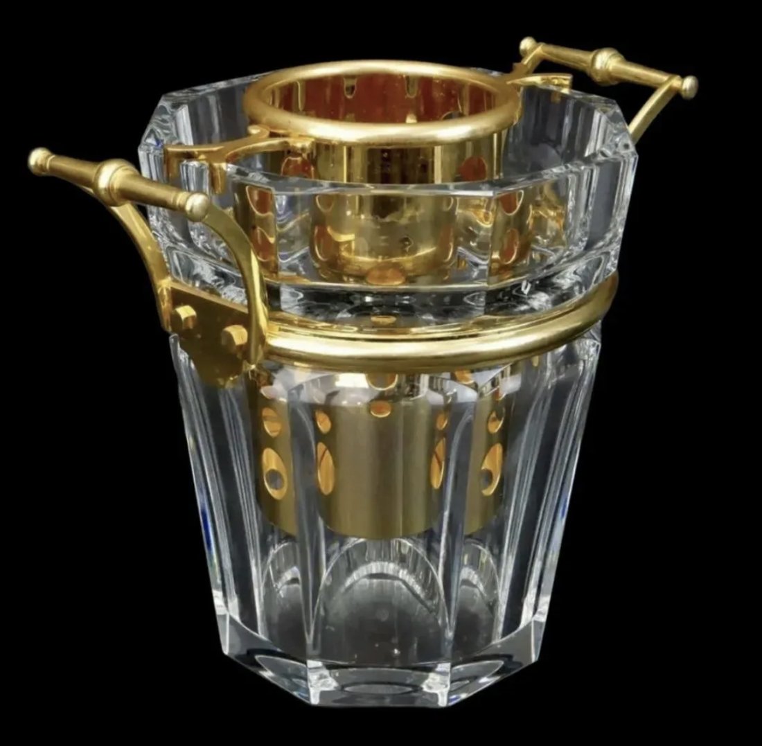 LARGE BACCARAT HARCOURT ICE BUCKET: Large Baccarat "Harcourt" Crystal Champagne / Wine Bucket with Gilded Metal Mounts. Bottle holder insert included in the lot. Measures 9-1/2" x 11-1/4" (w/handle). Condition:very Good condition. Estim
