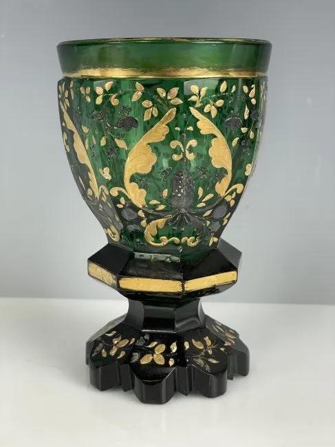 A FINE ENAMELED AND GILT MOSER BEAKER: Circa 1900. Measures 5 inches tall. In good condition. Estimate $600-800
