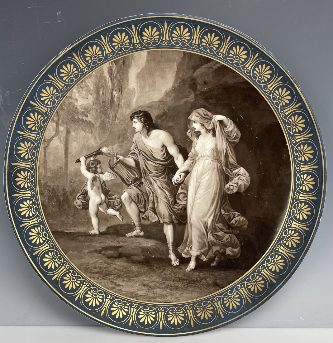 A LARGE ANTIQUE PORCELAIN PLATTER (1 of 4)