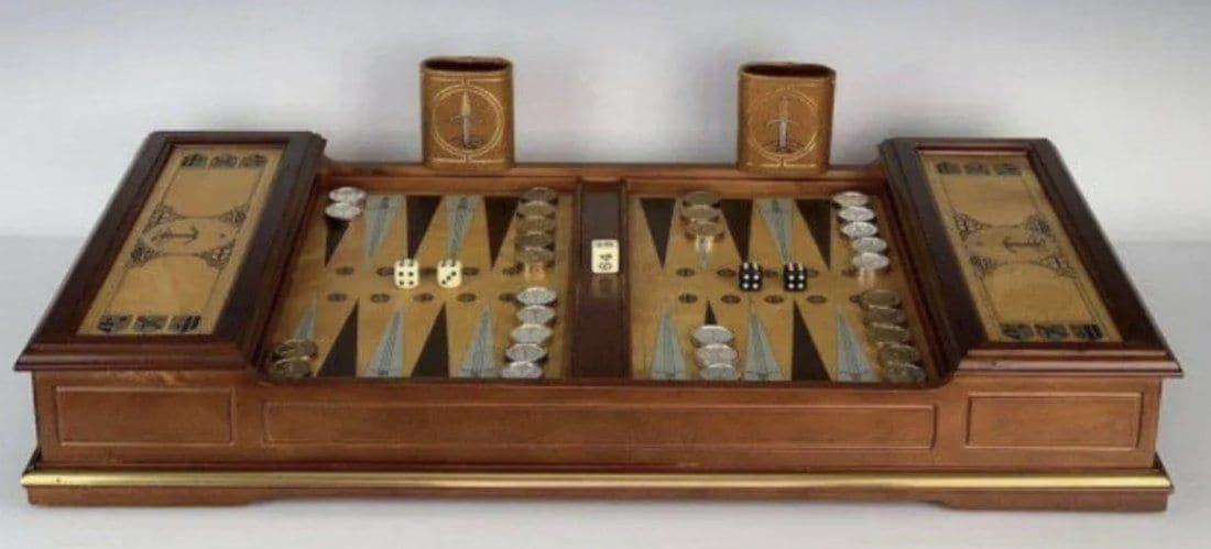 FRANKLIN MINT BACKGAMMON SET: The Franklin Mint Backgammon Set is 26-1/8 inches long, by 14.75 inches wide, by 3.5 inches tall. Each metal playing piece 1-1/8 inches acr0ss by .25 inches wide. Let us know if you have any questions