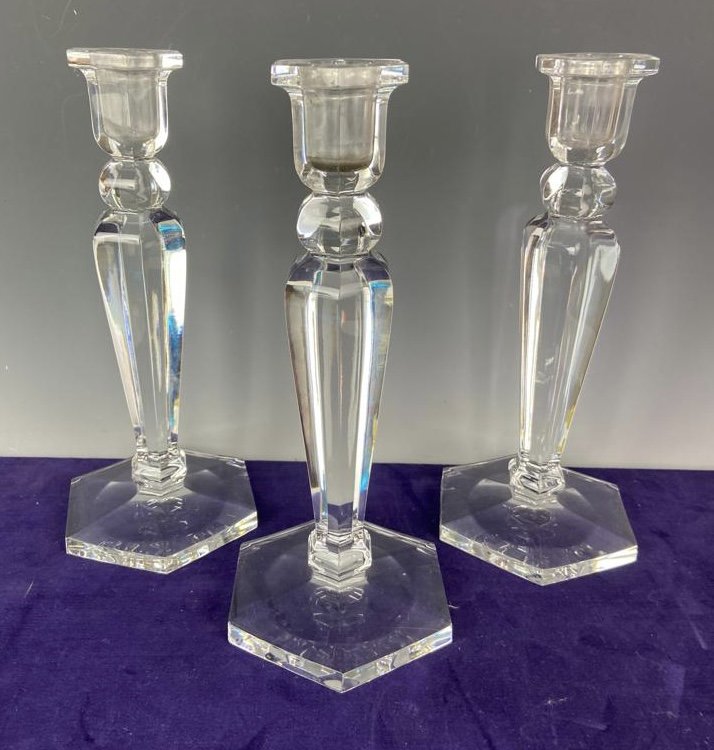 SET OF 3 SIGNED BACCARAT CANDELHOLDERS: Stamped Baccarat. In good used condition. Estimate $600-800