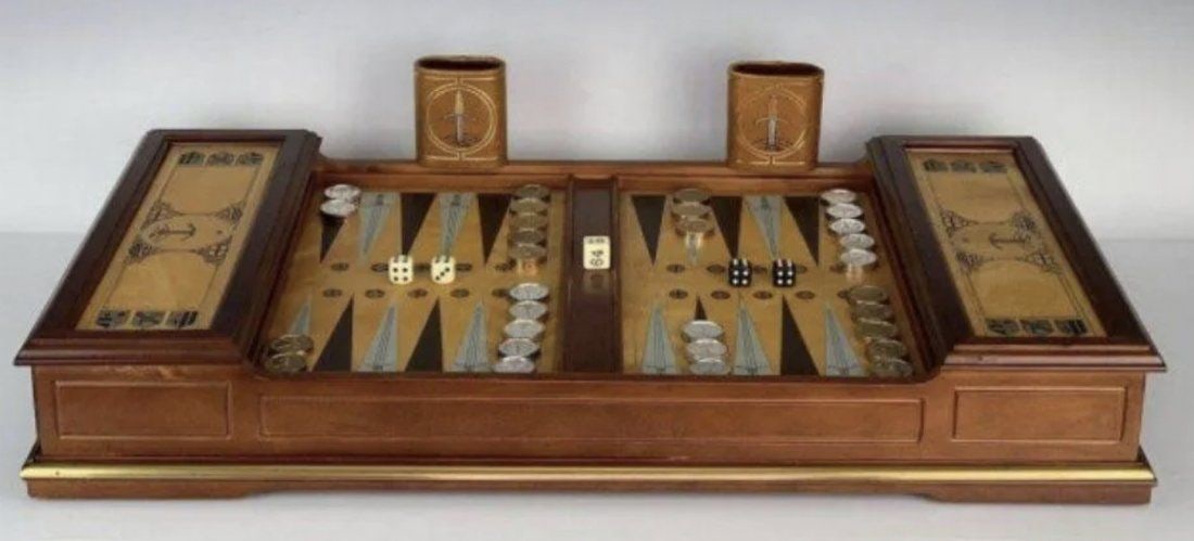 FRANKLIN MINT BACKGAMMON SET: The Franklin Mint Backgammon Set is 26-1/8 inches long, by 14.75 inches wide, by 3.5 inches tall. Each metal playing piece 1-1/8 inches acr0ss by .25 inches wide. Let us know if you have any questions