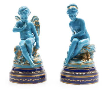 A PAIR OF 19TH C. SEVRES FIRURES: Pair of Sevres Porcelain Cupid and Psyche Figures,France, 19th century,turquoise blue ground figures decorated with gold, with circular cobalt ground bases set with white beaded jeweling, ht. 10 3/4,