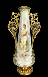 A LARGE SEVRES PORCELAIN AND CHAMPLEVE ENAMEL VASE: Circa 1900. Signed Labarre. Measures 13.5” high. In good antique condition.Estimate $1.000-1.200