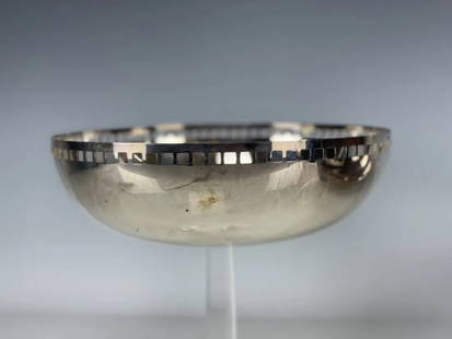 RICHARD MEIER FOR SWID POWELL SKYSCRAPER SILVER PLATE BOWL: Circa 1990. 10 inches diameter.Signed. Estimate $600-800