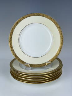 SET OF 7 MINTON TIFFANY GILT PLATES: Measure 7.5 inches diameter. All in good condition. Estimate $500-600