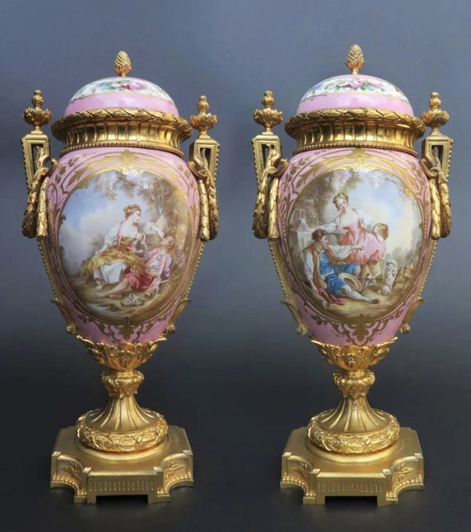 A LARGE PAIR OF ORMOLU MOUNTED SEVRES PORCELAIN VASES (1 of 3)