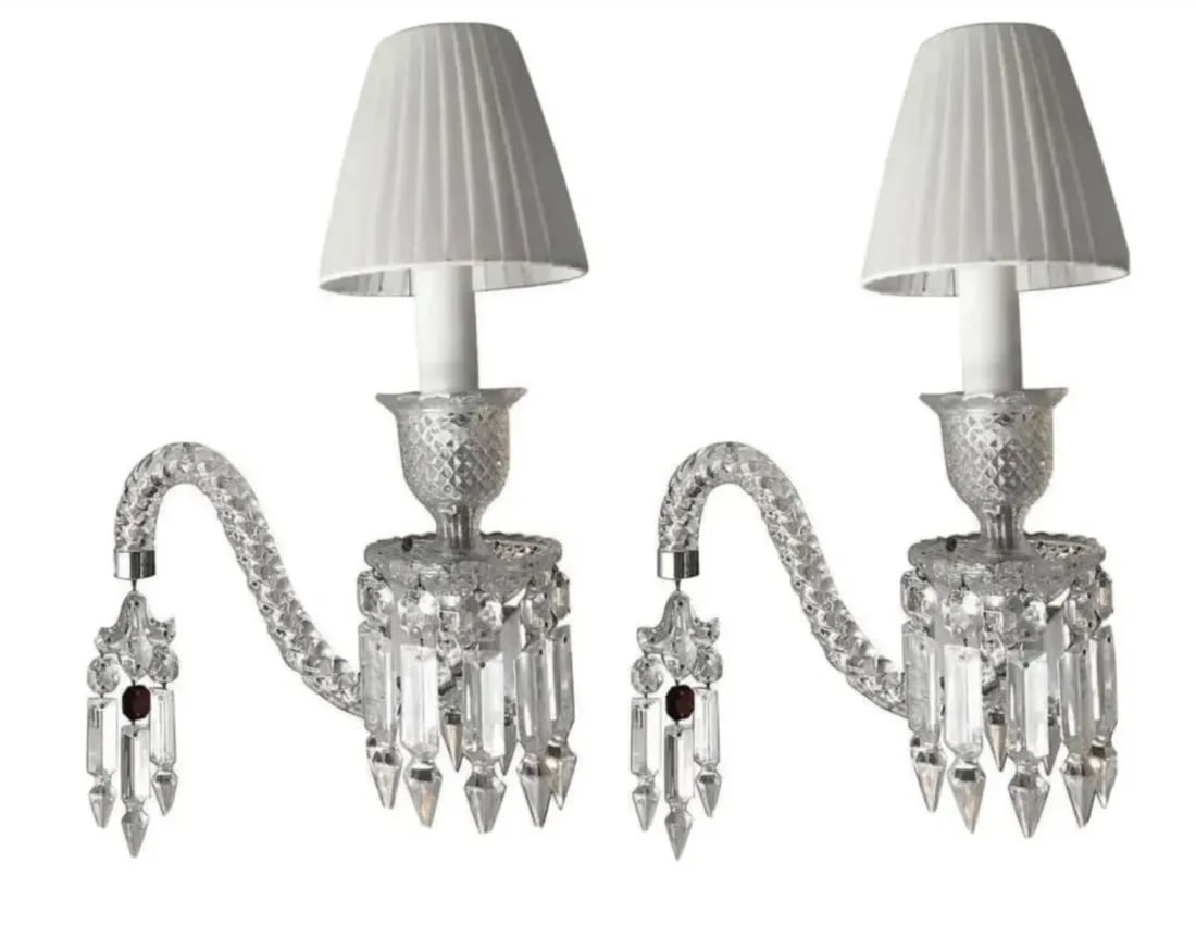 A PAIR OF FANTOME BACCARAT PENDANT LIGHTS: A pair of handcrafted full-lead crystal Fantome pendant lights designed by Arik Levy for Baccarat. Hung from silver metal ceiling mount as shown. Drop height can be adjusted. Estimate $4.000-5.000