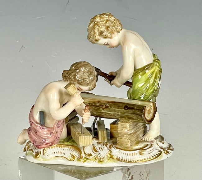 19TH C. MEISSEN GROUP OF CARPENTERS: First quality cross swords mark. Measures 5 inches h., 5.25 long. Estimate $800-1000