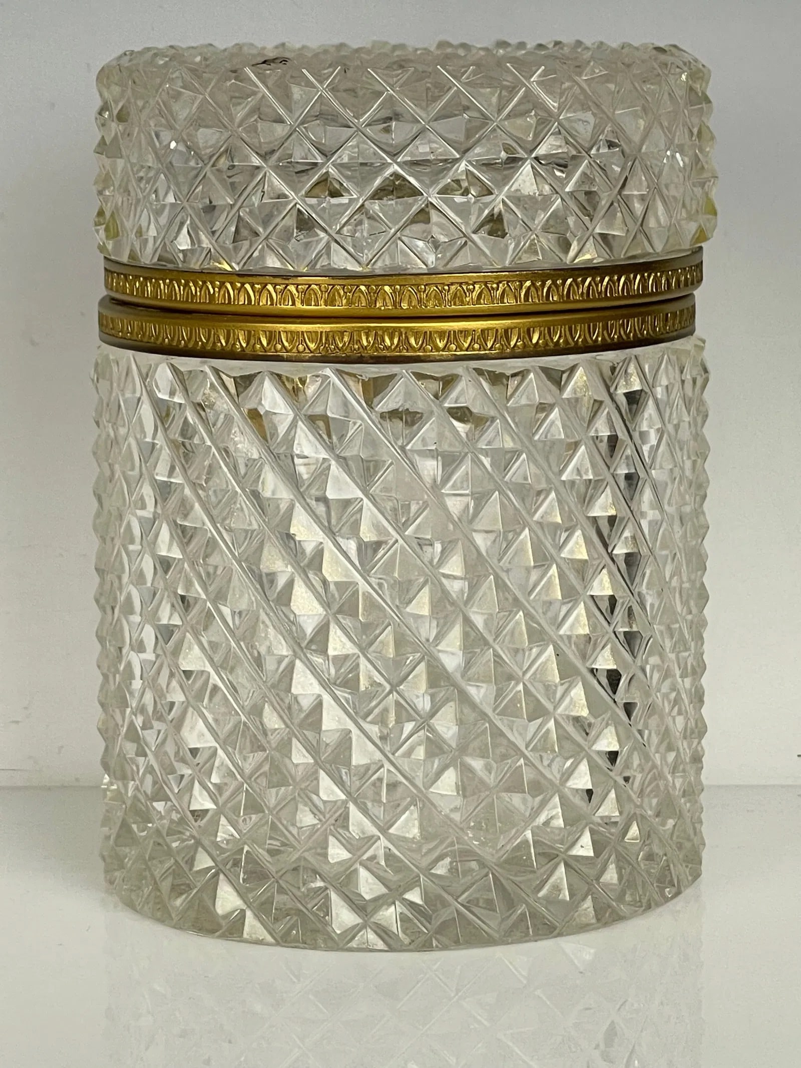 ORMOLU MOUNTED BACCARAT CRYSTAL BOX: Circa 1900. Measures 3.5 inchesm d. 4 inchesm high. In excellent condition. Estimate $600-800