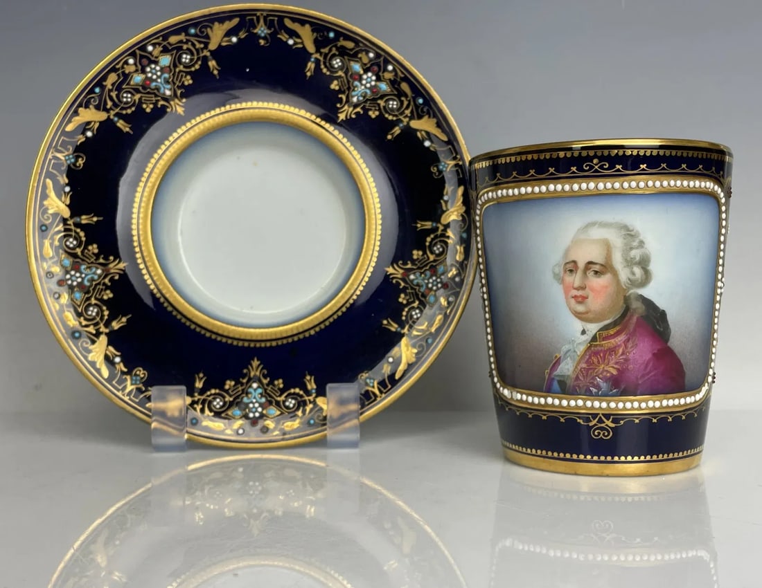 A LARGE JEWELLED SEVRES PORCELAIN CUP AND SAUCER (1 of 6)
