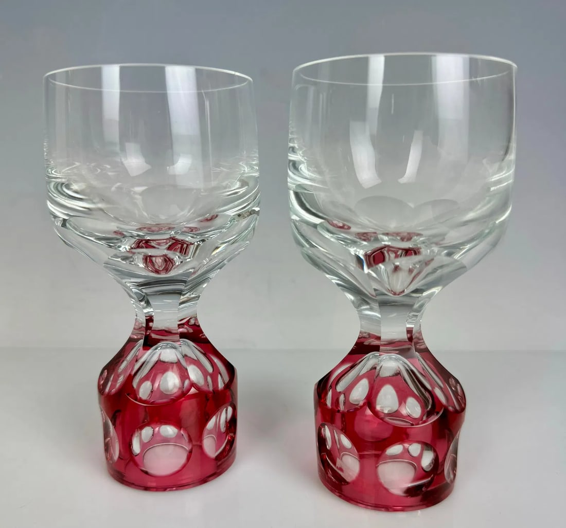 A PAIR OF UNUSUAL MOSER GLASSES: Can be used as wine glasses from one end, and shot glasses from other end. Measure 6 inches h.Excellent condition. Estimate $400-500
