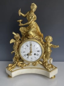 DORE BRONZE AND MARBLE FIGURAL CLOCK