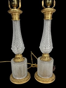 A PAIR OF EMPIRE STYLE ORMOLU AND BACCARAT STYLE CRYSTAL LAMPS