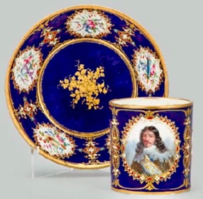 A VERY FINE JEWELLED SEVRES CUP AND SAUCER