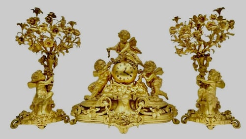 A PALATIAL DORE BRONZE FIGURAL CLOCK SET