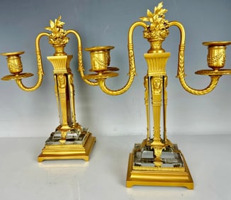 A PAIR OF ORMOLU AND BACCARAT CRYSTAL CANDELABRA