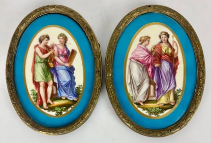 A PAIR OF ORMOLU MOUNTED SEVRES PORCELAIN PLAQUES