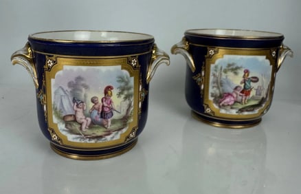 A PAIR OF JEWELED SEVRES FLOWER POTS