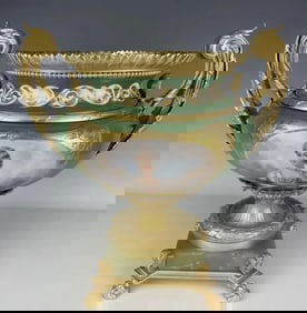 A LARGE ORMOLU MOUNTED SEVRES PORCELAIN CENTREPIECE