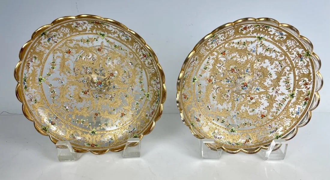 A FINE PAIR OF GILT AND ENAMELED MOSER TAZZAS: Circa 1900. Measure 6.5 inches d. In good antique condition, minor gold loss. Estimate $800-1.000
