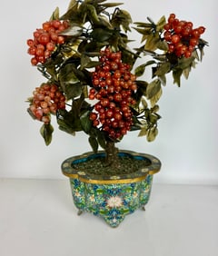 A LARGE CHINESE CLOISONNE AND HARD STONE PLANT