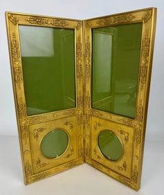 A LARGE EMPIRE DORE BRONZE PICTURE FRAME
